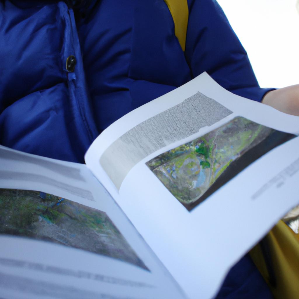 Person holding a map, researching